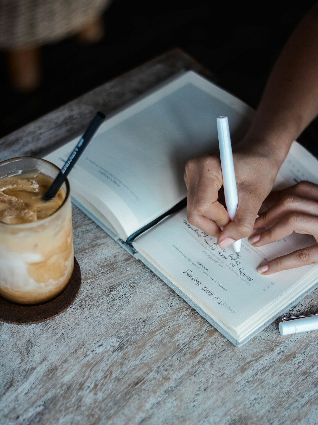 person writing notes